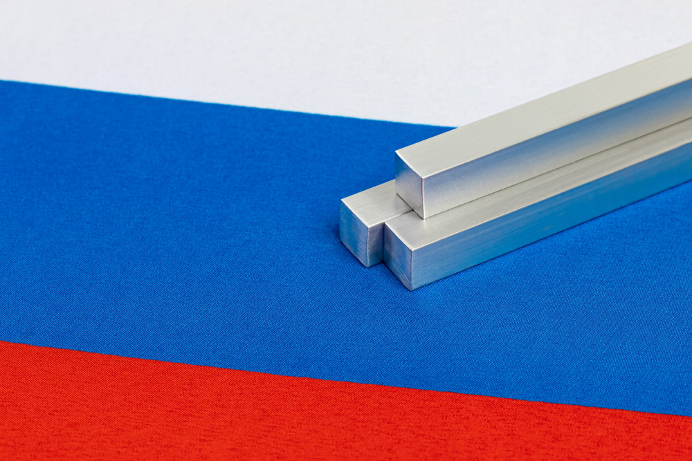 Aluminum metal stock on Russia flag. Russian aluminum exports, aluminum manufacturing